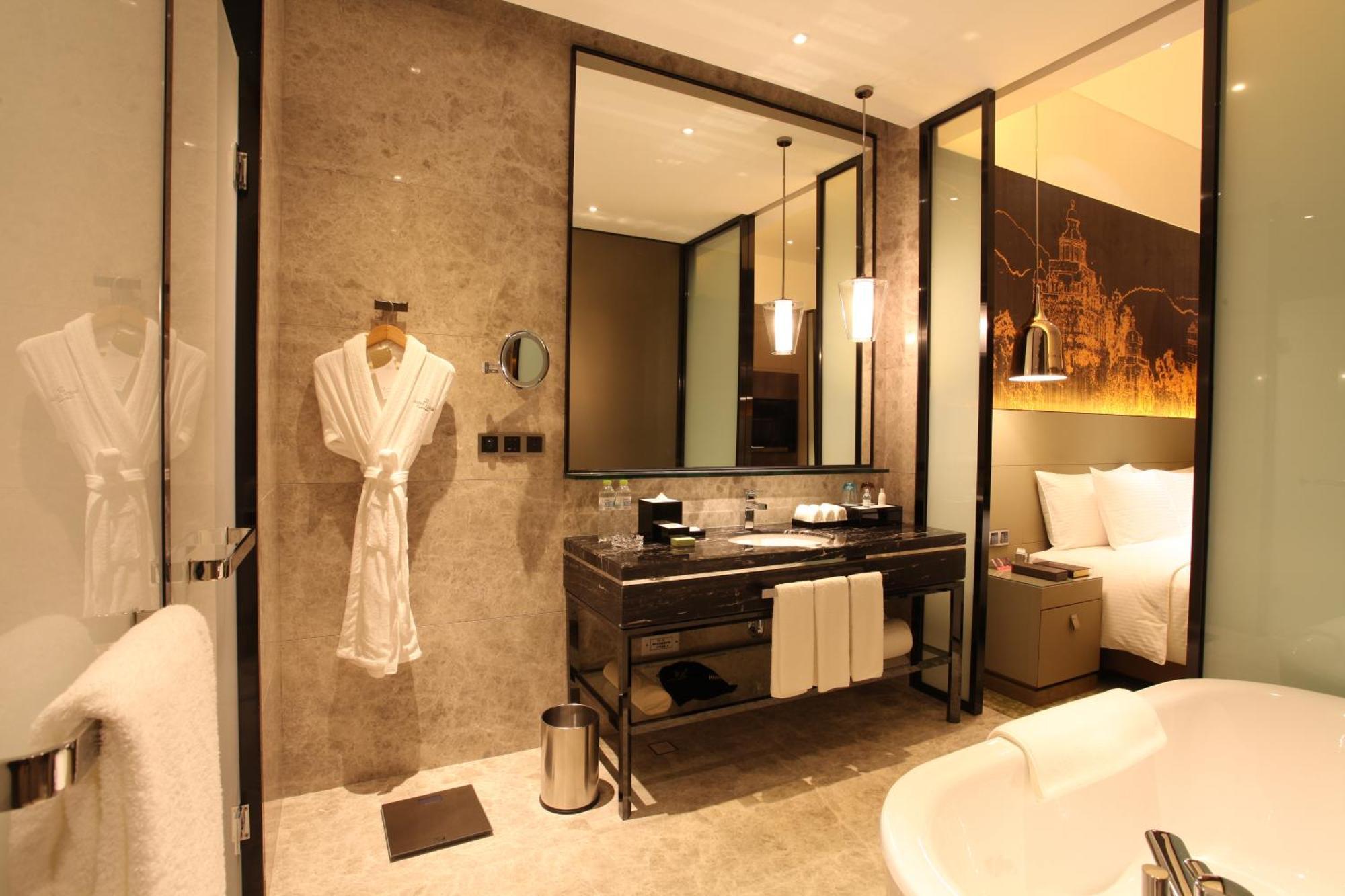 ว่านต้า เรล์ม เจียงเหมิน Hotel ภายนอก รูปภาพ