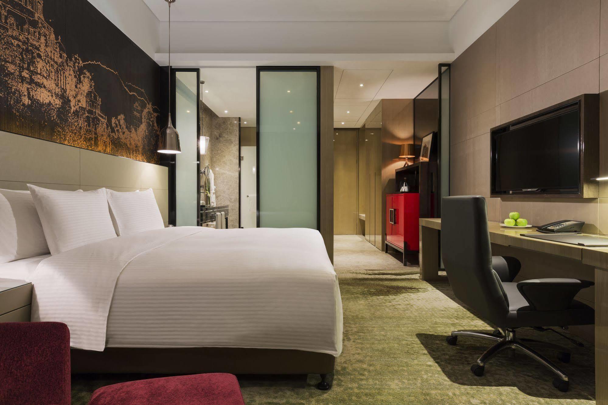 ว่านต้า เรล์ม เจียงเหมิน Hotel ภายนอก รูปภาพ