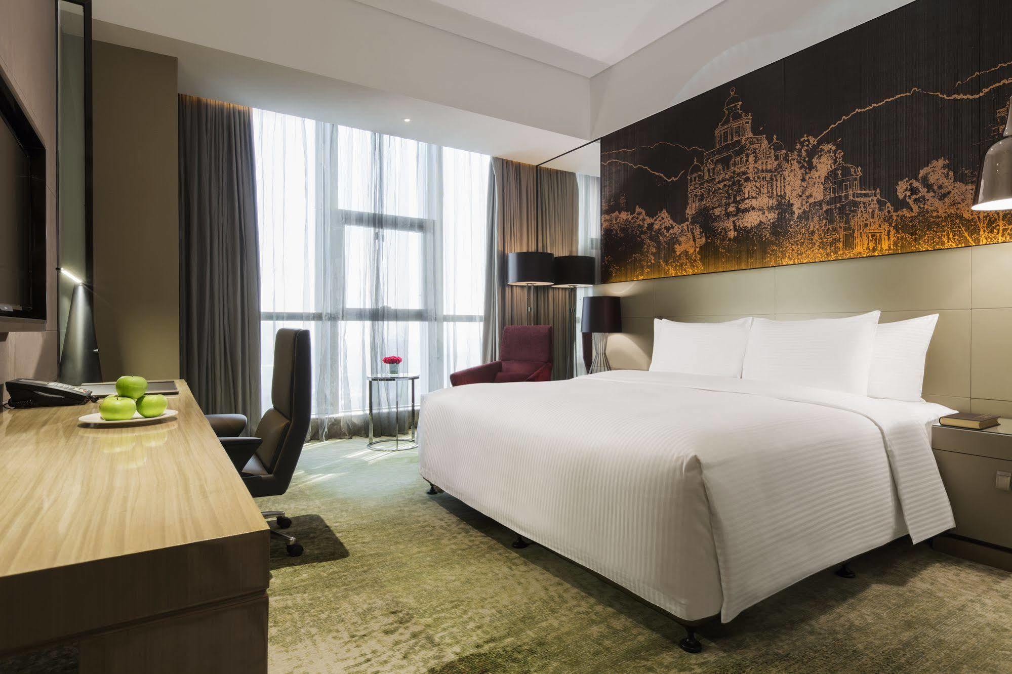 ว่านต้า เรล์ม เจียงเหมิน Hotel ภายนอก รูปภาพ