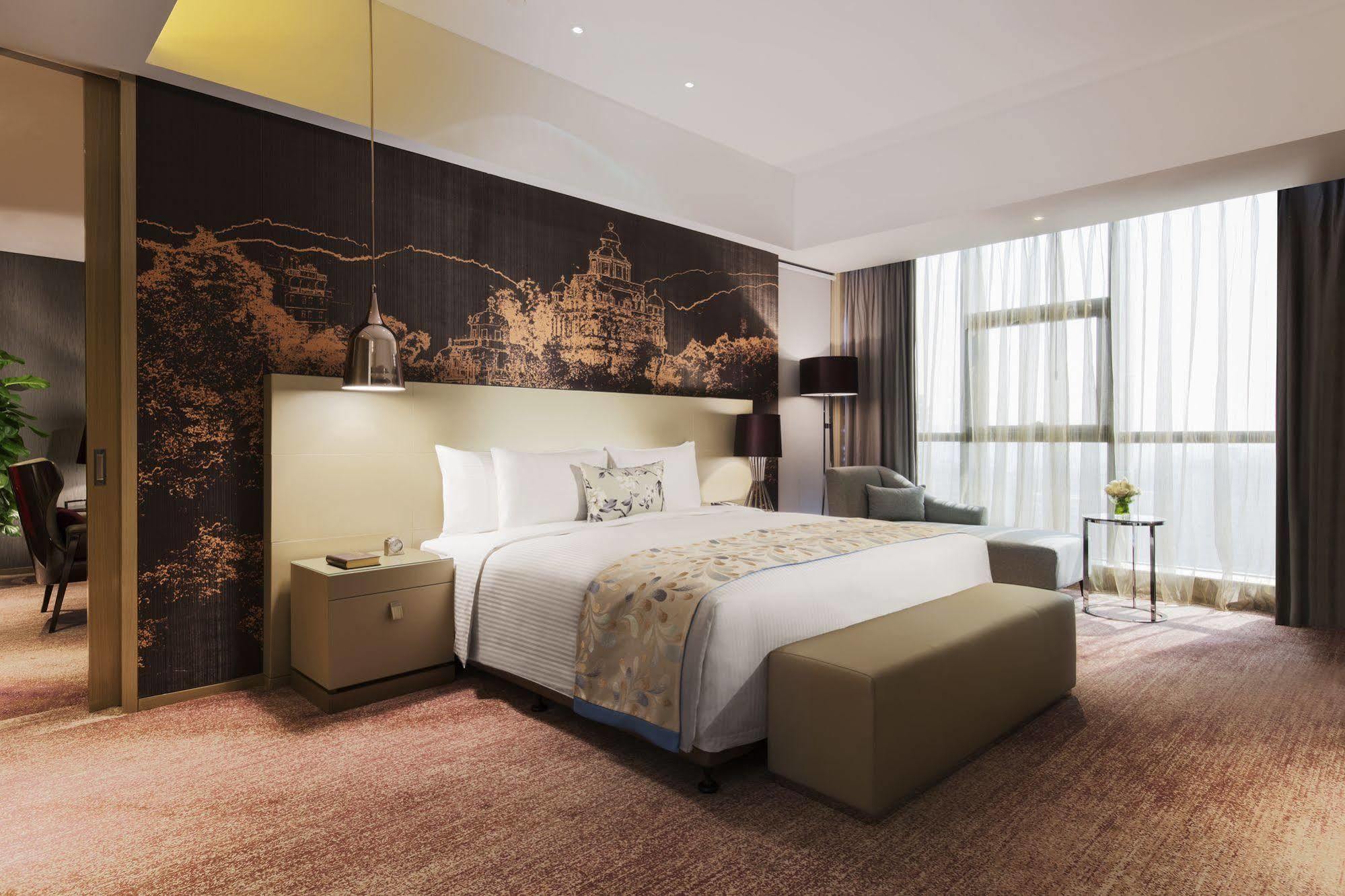 ว่านต้า เรล์ม เจียงเหมิน Hotel ภายนอก รูปภาพ
