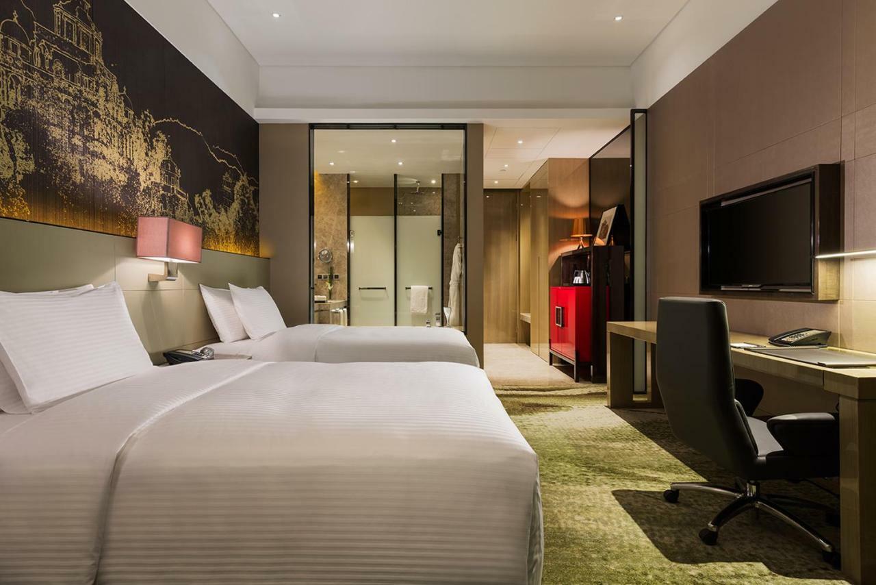 ว่านต้า เรล์ม เจียงเหมิน Hotel ภายนอก รูปภาพ